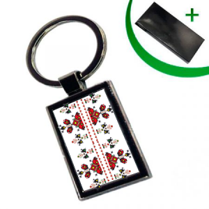 Правоъгълен метален ключодържател с народни мотиви.